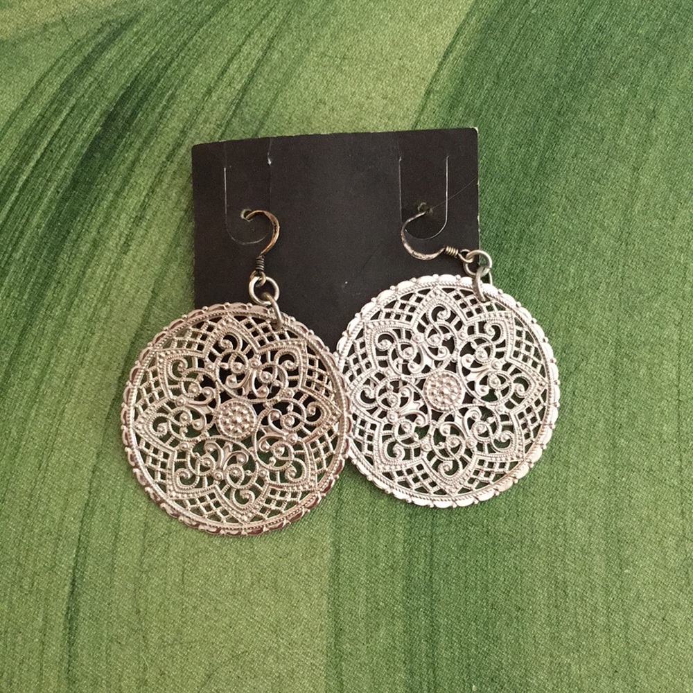 Adorable silver earrings. New with tags